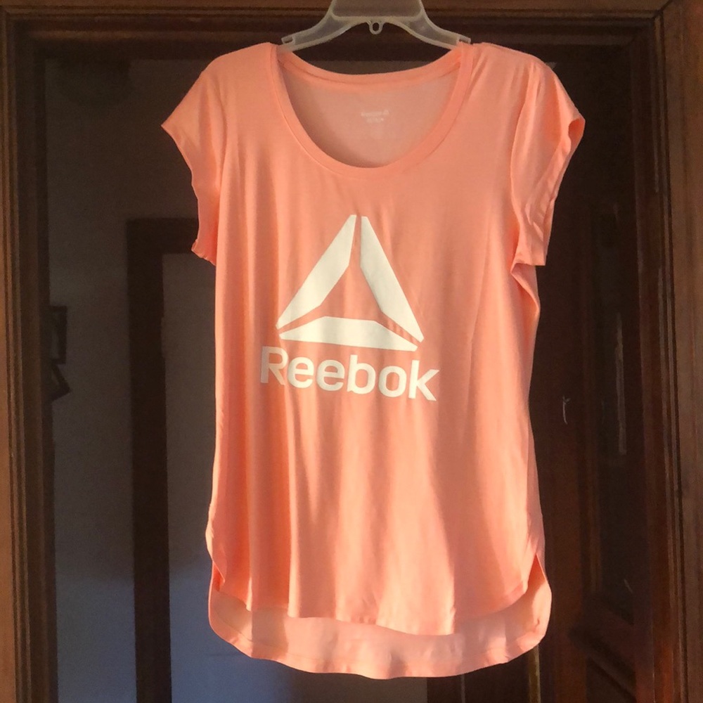 Reebok t shirt. NEVER WORN.